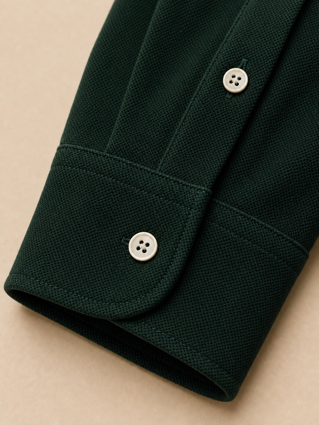 Close-up of the Aarsag long-sleeve polo shirt-style cuff